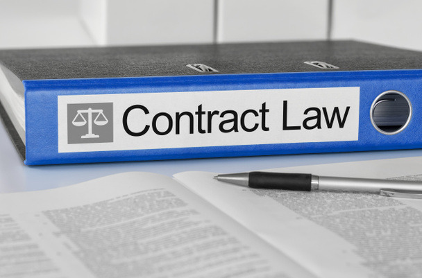 Синя папка з етикеткою "Закон про контракти". - Фото, зображення