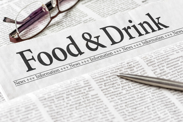 Μια εφημερίδα με την επικεφαλίδα φαγητό και ποτό - Φωτογραφία, εικόνα