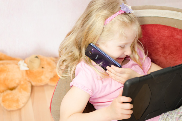 child with mobile and tablet - Photo, Image