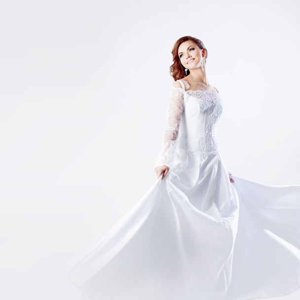 Beautiful bride in wedding dress, white background, square - 写真・画像