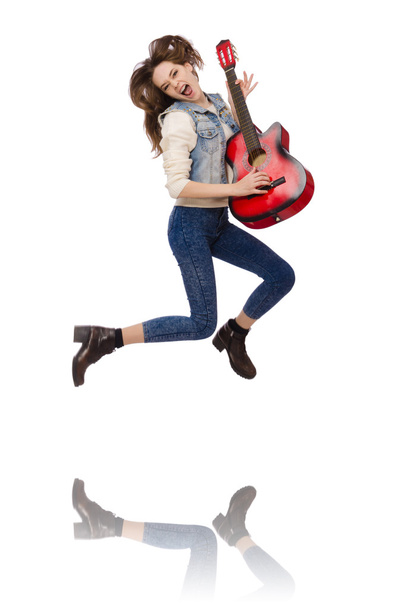 Young smiling girl with guitar isolated on white - Foto, afbeelding