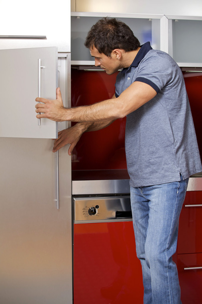 Man looking in refrigerator - Φωτογραφία, εικόνα