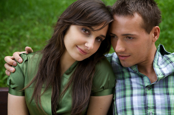 young couple sitting - Foto, imagen