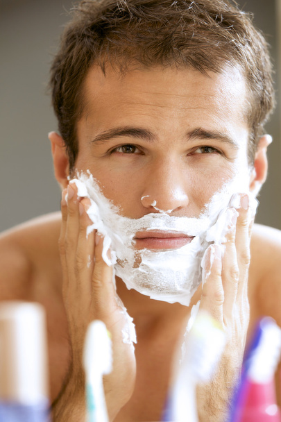 Man applying shaving cream - 写真・画像