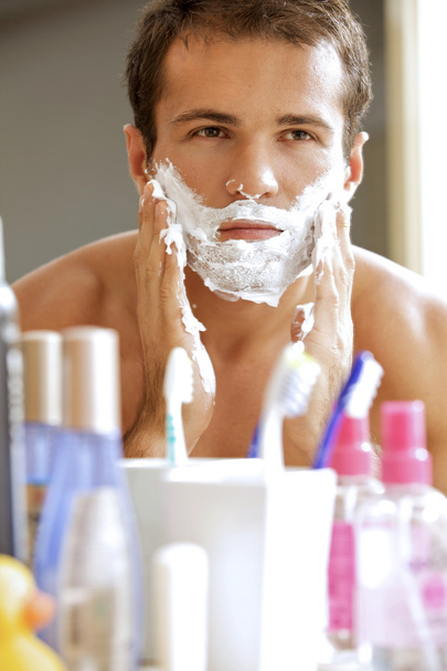 man applying shaving cream - 写真・画像