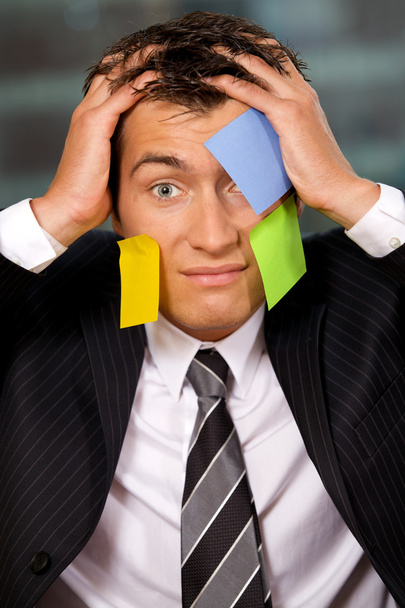 Businessmanwith blank adhesive notes - Foto, Imagen