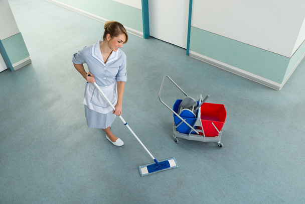 Janitor With Cleaning Equipment - 写真・画像