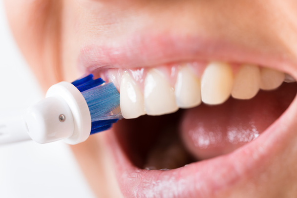 Person Brushing Teeth - Foto, immagini