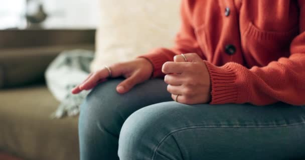 Hands, stress and anxiety worry on sofa with mental health depression or nervous, distress or fear. Person, fingers and adhd stimming in living room with touch for psychology, distracted or upset. - Footage, Video