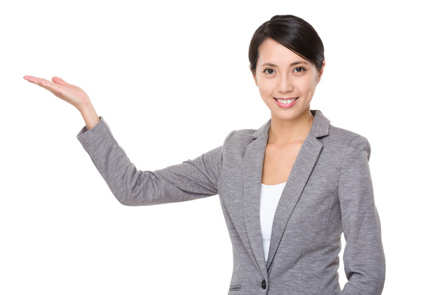 Asian businesswoman in grey suit - Foto, Imagen
