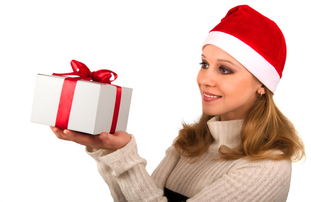 Attractive young girl with Christmas present - Photo, Image