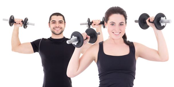 junger Mann und Frau in schwarz Sportbekleidung Übungen mit dum - Foto, Bild