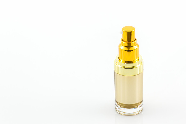 Cosmetics bottle, Golden Blank packaging bottle. - Foto, immagini