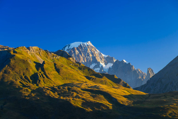 Landscape near Col du Petit-Saint-Bernard with Mont Blanc, on border France and Italy - Photo, Image