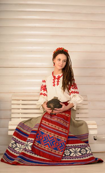 young woman in Slavic Belarusian national original suit studio - Photo, image