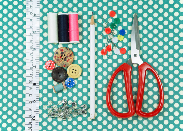 Sewing kit on polka dot fabric - Foto, Imagen
