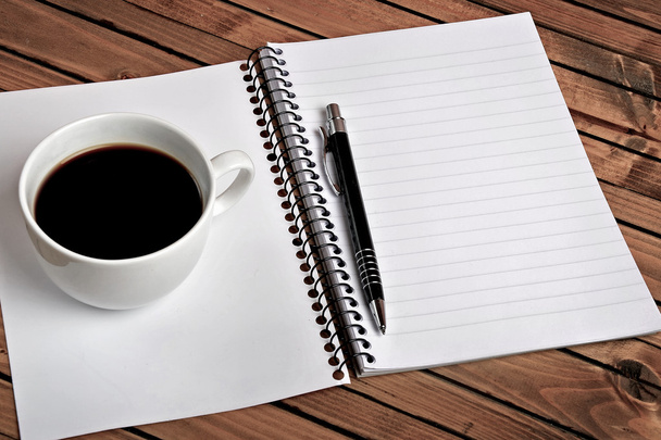 Notepad with coffee cup - Foto, Imagen