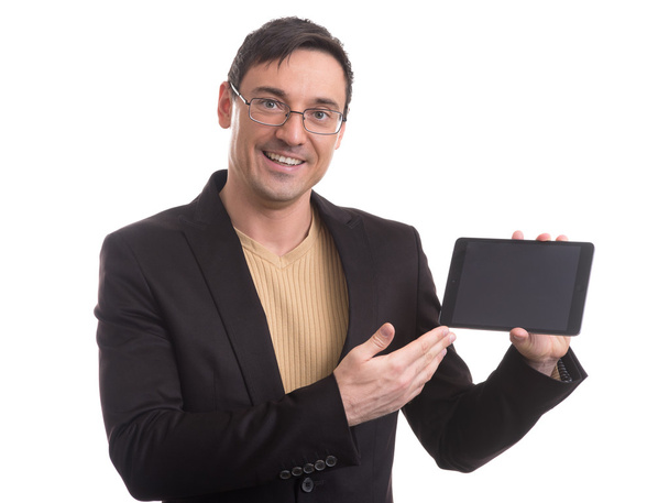 Business man shows digital tablet with blank screen - Foto, afbeelding