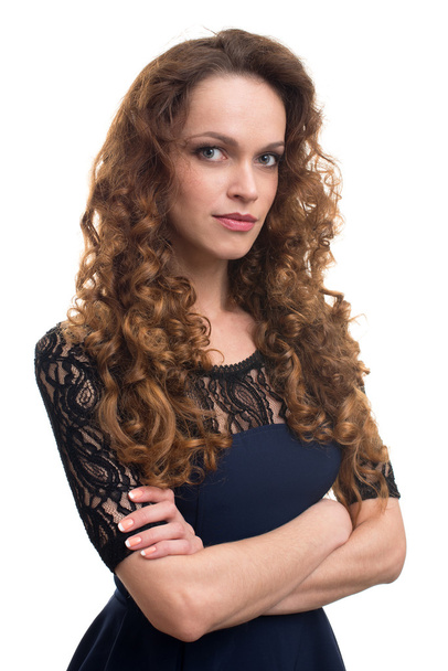 Beautiful young woman with long curly hair - Fotoğraf, Görsel