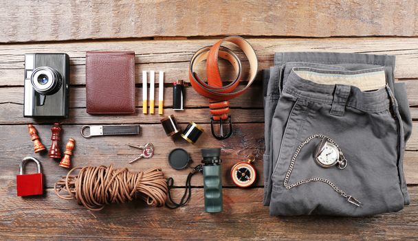 Hiking gear on wooden background - Foto, immagini