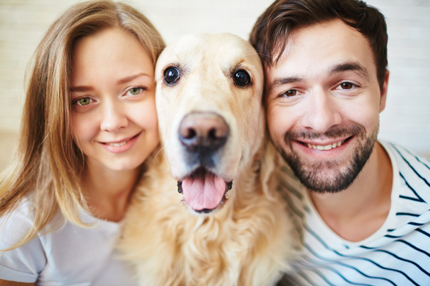 Young couple and their dog - Foto, Imagem
