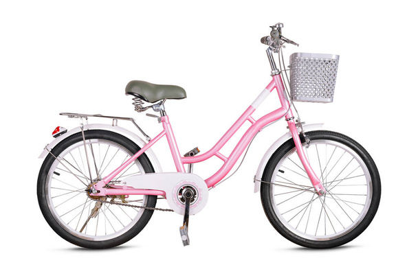 Vintage pink bike with charming basket, isolated on a white background - Photo, image
