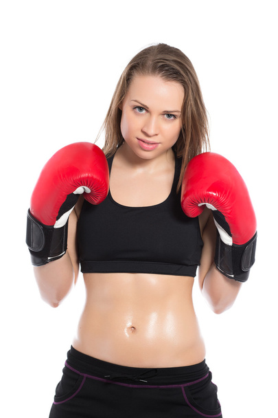Mujer posando con guantes de boxeo
 - Foto, imagen