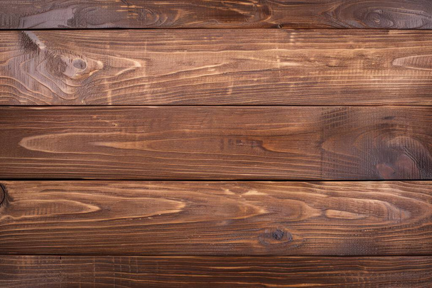 Esta imagen muestra maravillosamente tablones de madera ricamente manchados con detalles de grano natural mejorados. - Foto, imagen