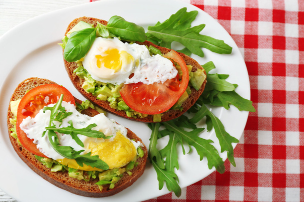 Sandwiches with egg, avocado and vegetables - Фото, изображение