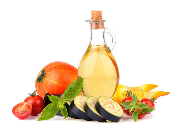 Olive oil with pumpkin, eggplant and tomatoes - Фото, изображение