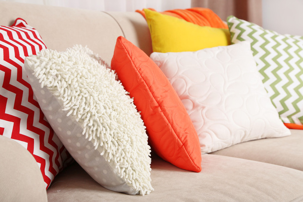 Sofa with colorful pillows in room - Photo, image