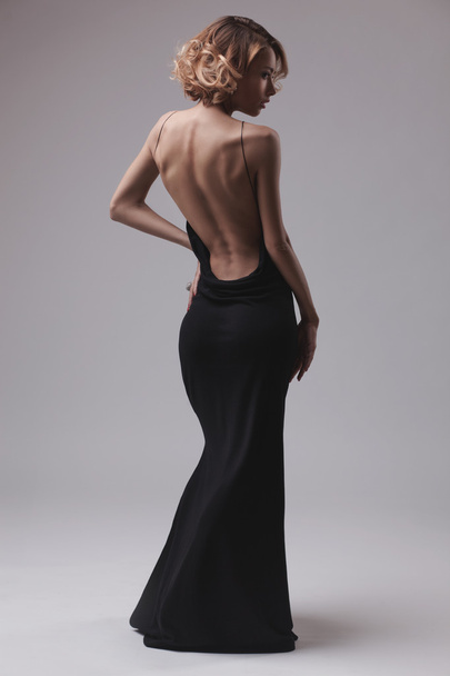 beautiful woman model posing in elegant dress - Фото, зображення