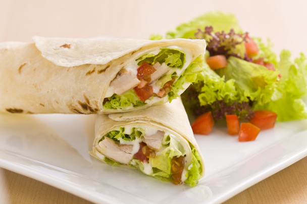 Two avocado wrap with a healthy side salad - Photo, Image
