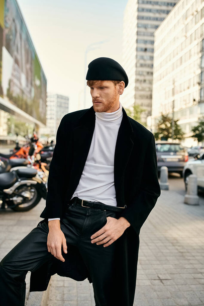 A young red-haired man in a black suit and white shirt strolling through the city. - Photo, Image