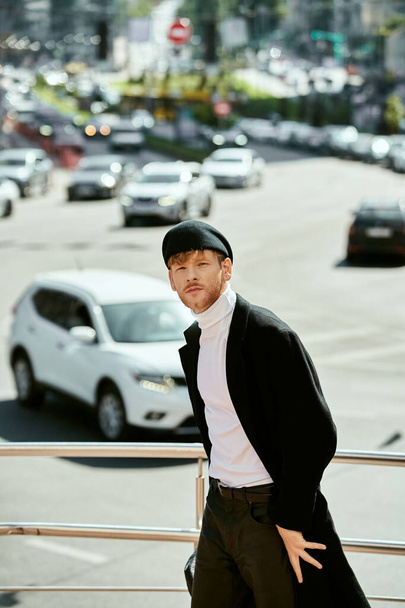Young red-haired man in debonair attire strolling through the city. - Photo, Image