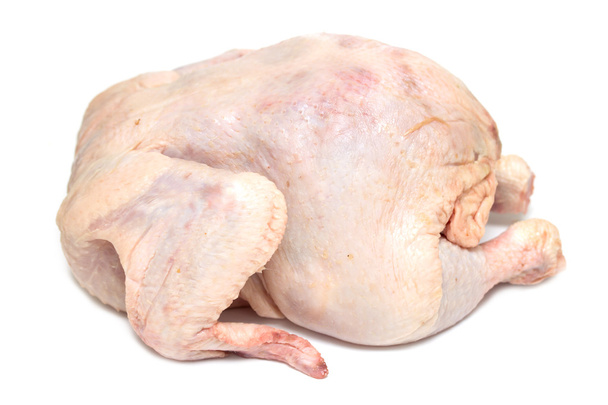 rauwe kip op een witte achtergrond - Foto, afbeelding