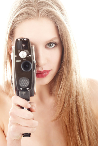 Retrato de mujer rubia con cámara de vídeo vieja
 - Foto, imagen