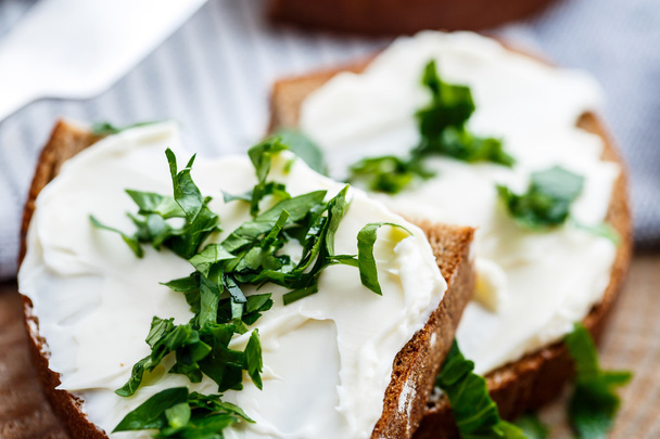 Sandwiches with melted cheese and herbs - Photo, image