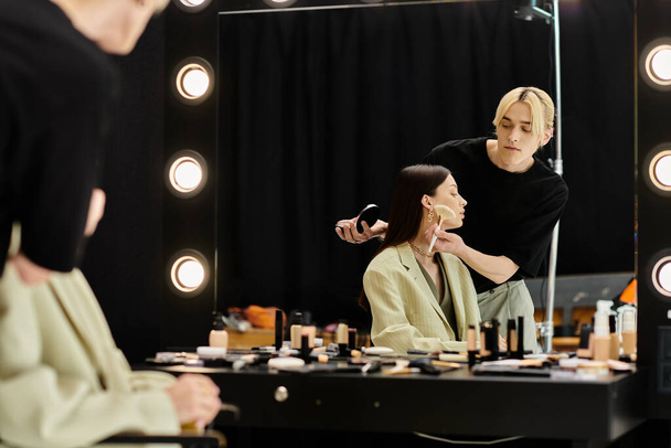 Beautiful woman enjoying makeup session with stylist. - Photo, Image
