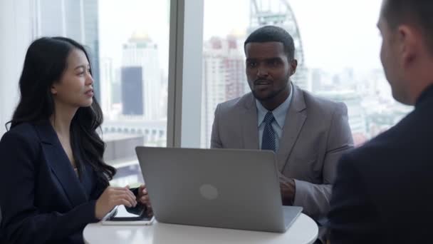 Ornamented office overlooking city skyline, diversity corporate professional discuss ambitious business expansion or strategic marketing. Financial advisor give consulting business insights and idea - Footage, Video