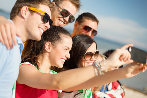 group of friends taking selfie with cell phone - Fotoğraf, Görsel