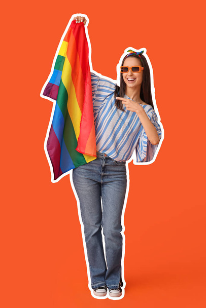 Bella giovane donna che punta la bandiera LGBT su sfondo arancione - Foto, immagini
