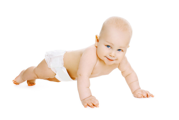 Portrait of baby in diapers crawls on the floor - 写真・画像