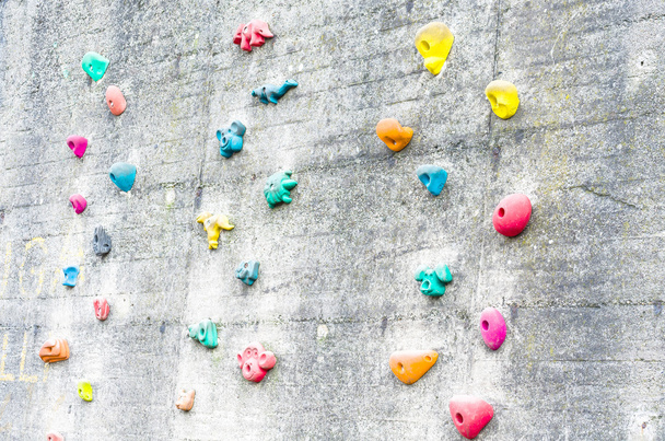 Klimmen muur met aids klimmen - Foto, afbeelding