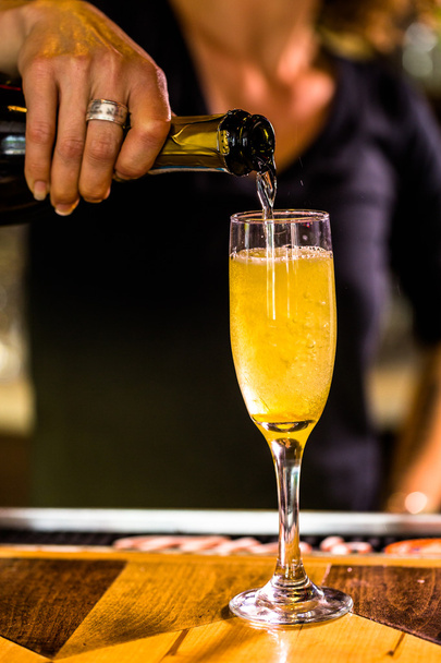 Bartender making Bellini cocktail - Photo, Image