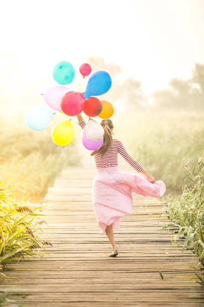 Woman with balloons - Photo, image