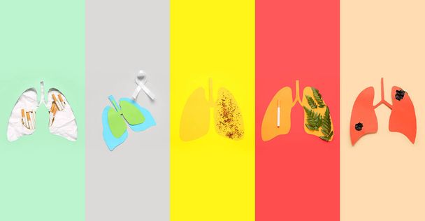 Set di polmoni di carta su sfondo a colori. Concetto di cancro - Foto, immagini