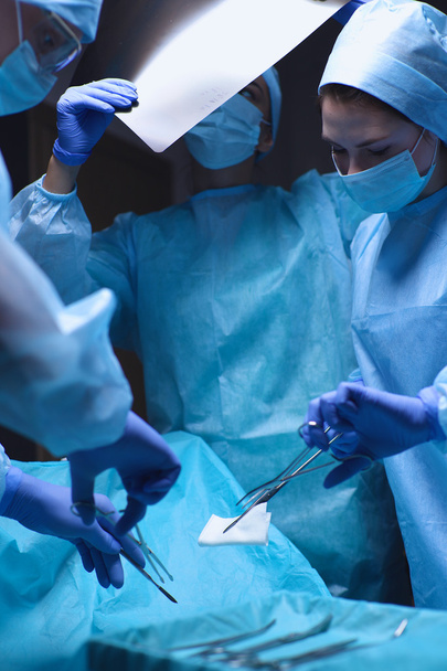 Team surgeon at work in operating - Fotó, kép