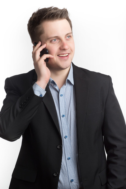 Man talking on the mobile phone and smiling - Fotografie, Obrázek