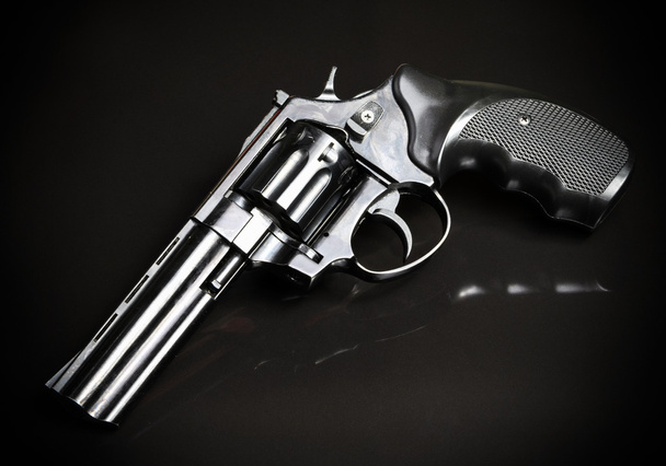 Revolver gun on black background - Photo, Image